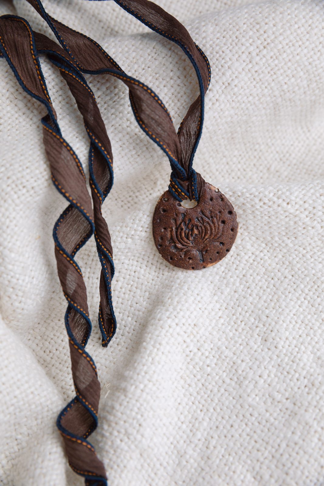 Gindi Girl Red Earth ceramic pendant necklace