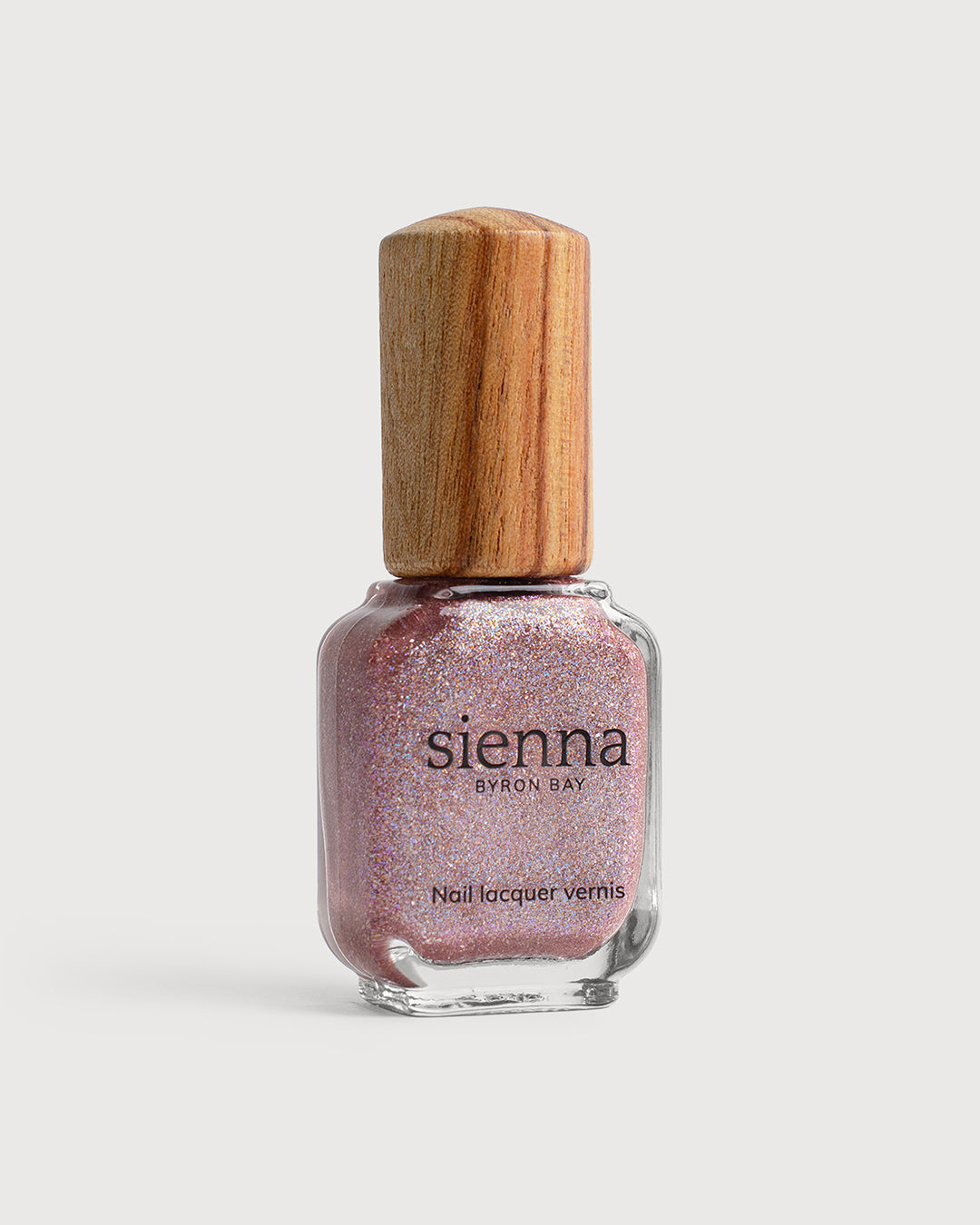 Nebula holographic amethyst shimmer Sienna nail polish bottle with timber cap
