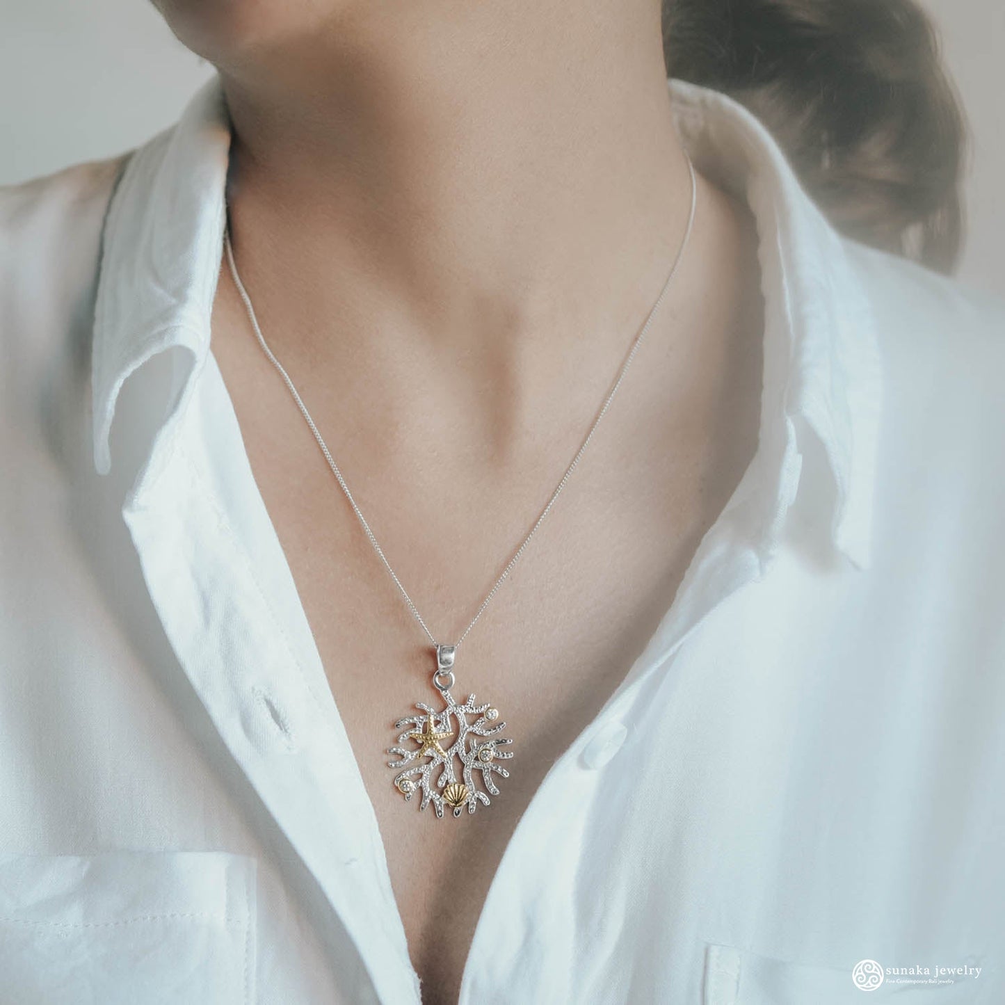 Sunaka Coral Reef pendant worn