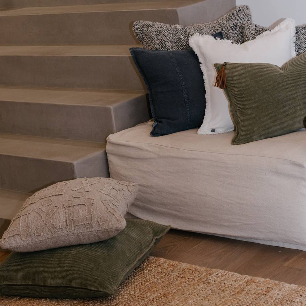 Hudson Corduroy Cushion Moss Green in living room