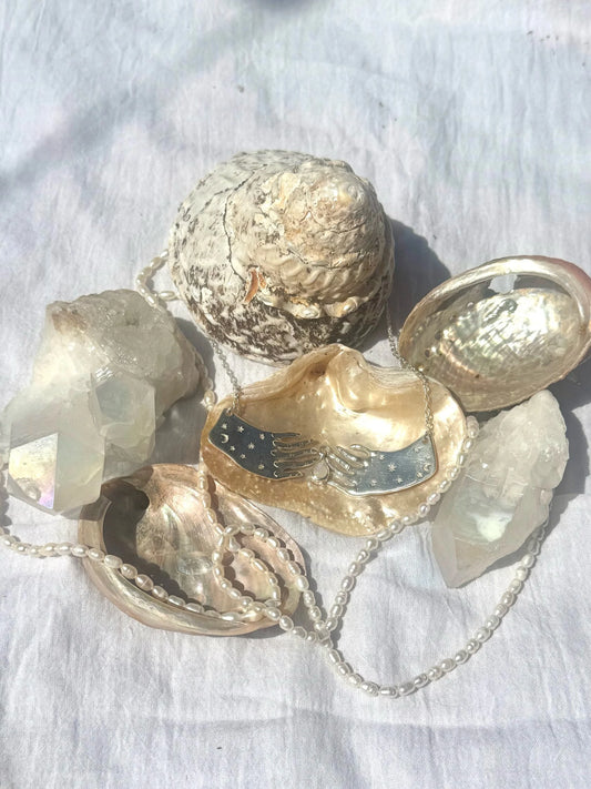 Cosmic Hands Necklace