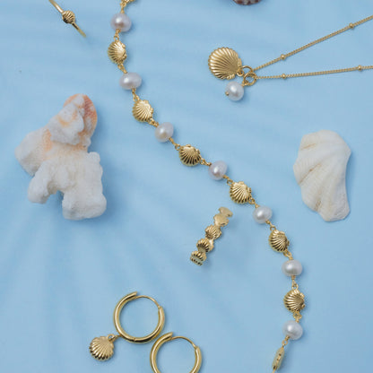 Sunaka Shell Pearl hoop earrings worn