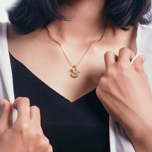Sunaka Seahorse double pendant worn