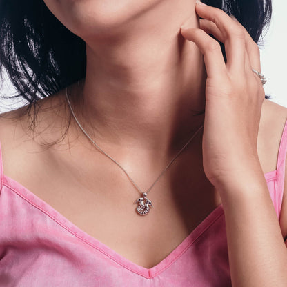 Sunaka Seahorse double pendant worn