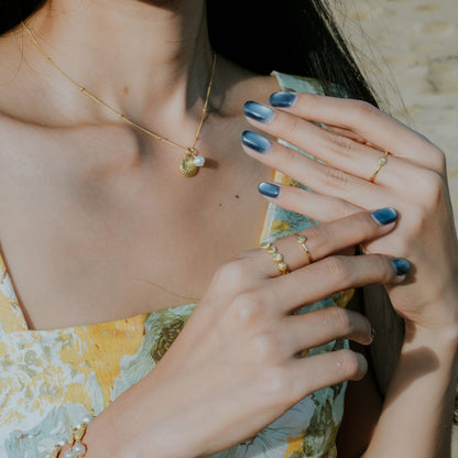 Sunaka Shell Pearl necklace worn
