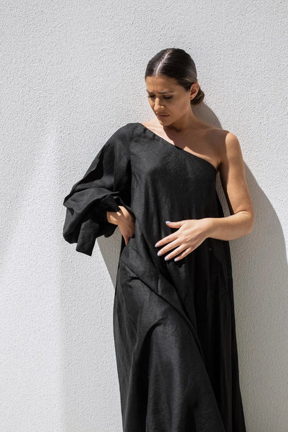 Black Balloon Sleeve Swing Dress by ISABELLA LONGGINOU