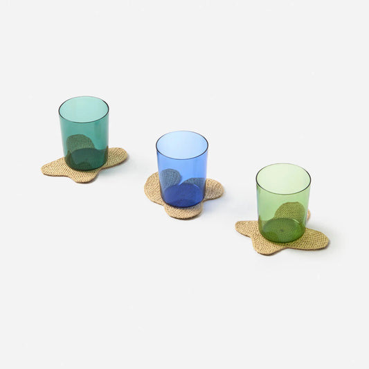 Rano wavy handwoven raffia coasters by TANORA