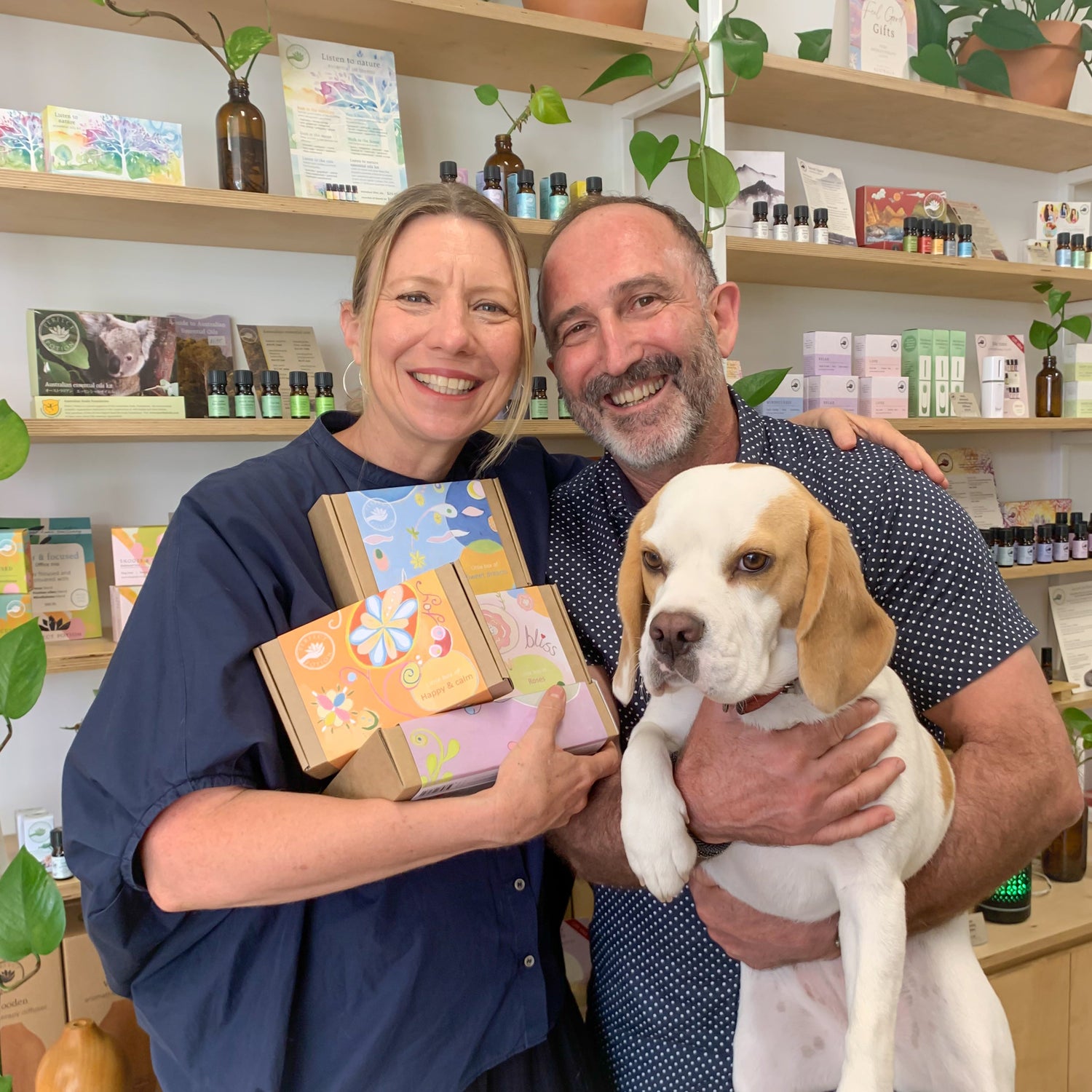 Sal and Carolyn Battaglia with their beagle Lucy at the home of Perfect Potion