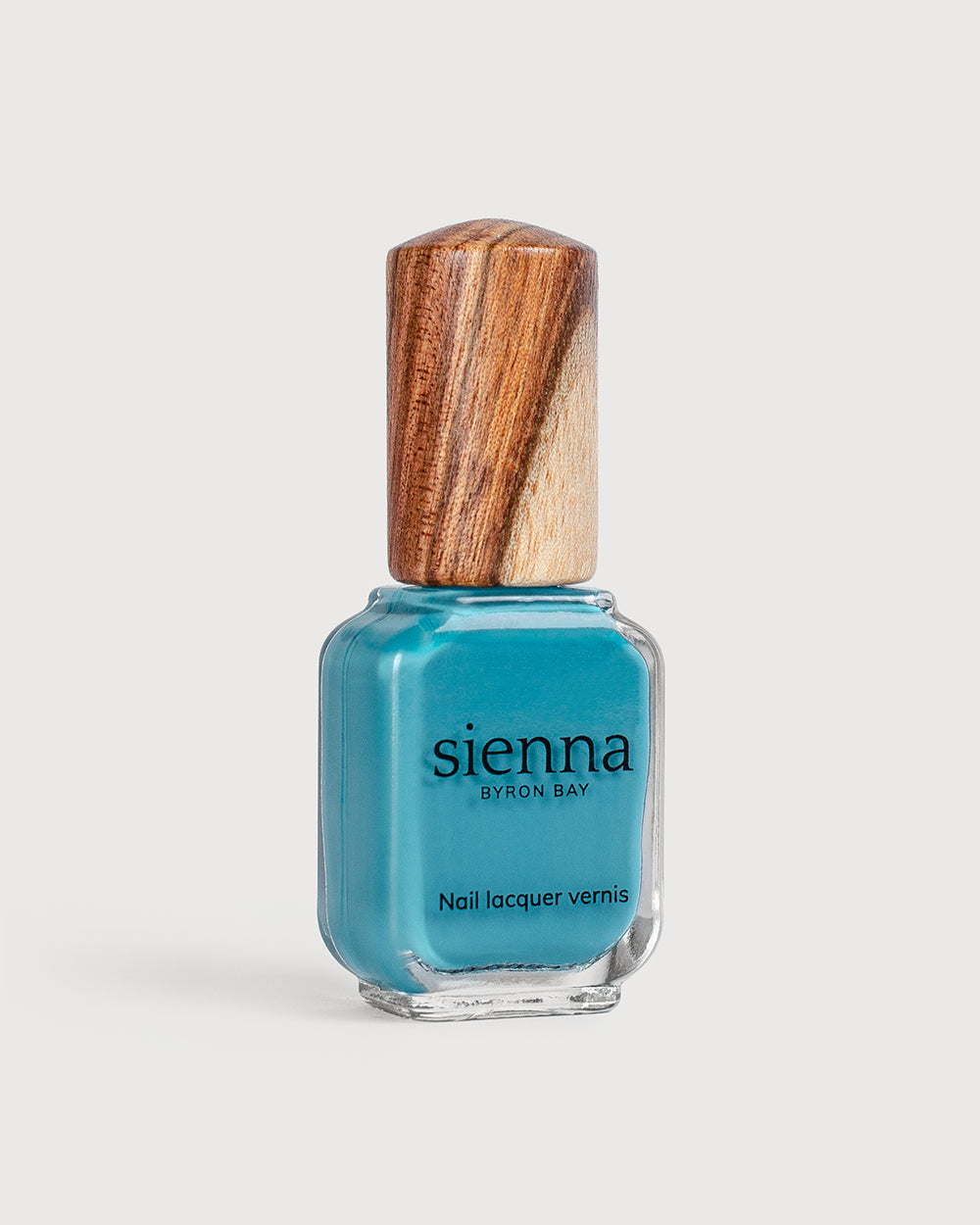 Stillness mid turquoise teal creme Sienna nail polish bottle with timber cap