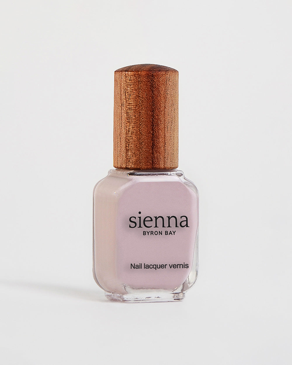 Tranquility light mauve rose creme Sienna nail polish bottle with timber cap