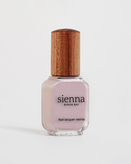 Tranquility light mauve rose creme Sienna nail polish bottle with timber cap
