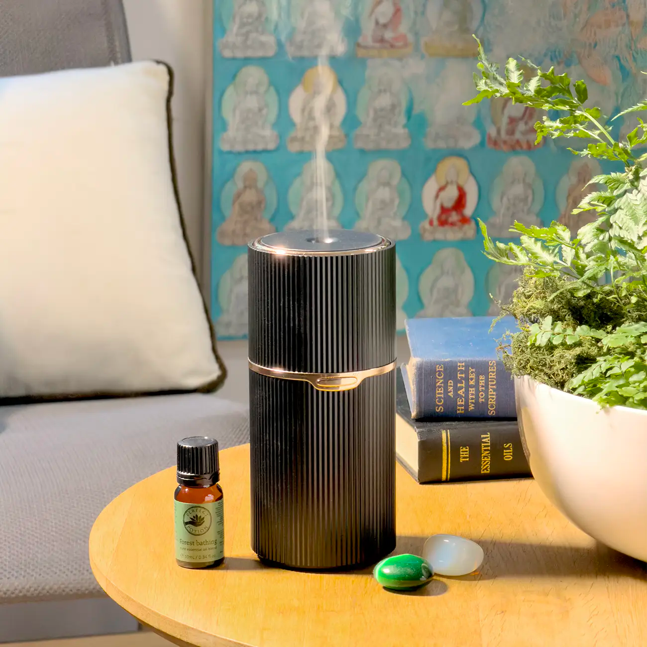 Wonder Mist Portable Diffuser on coffee table by Perfect Potion