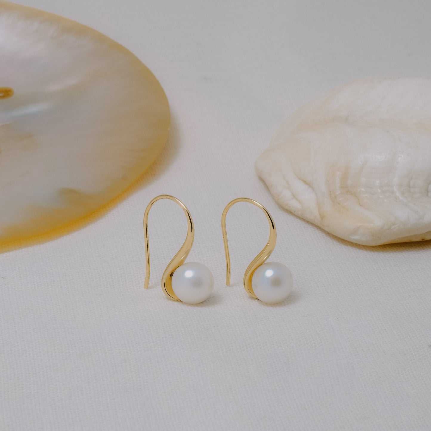 Sunaka Lumine Pearl hook earrings worn