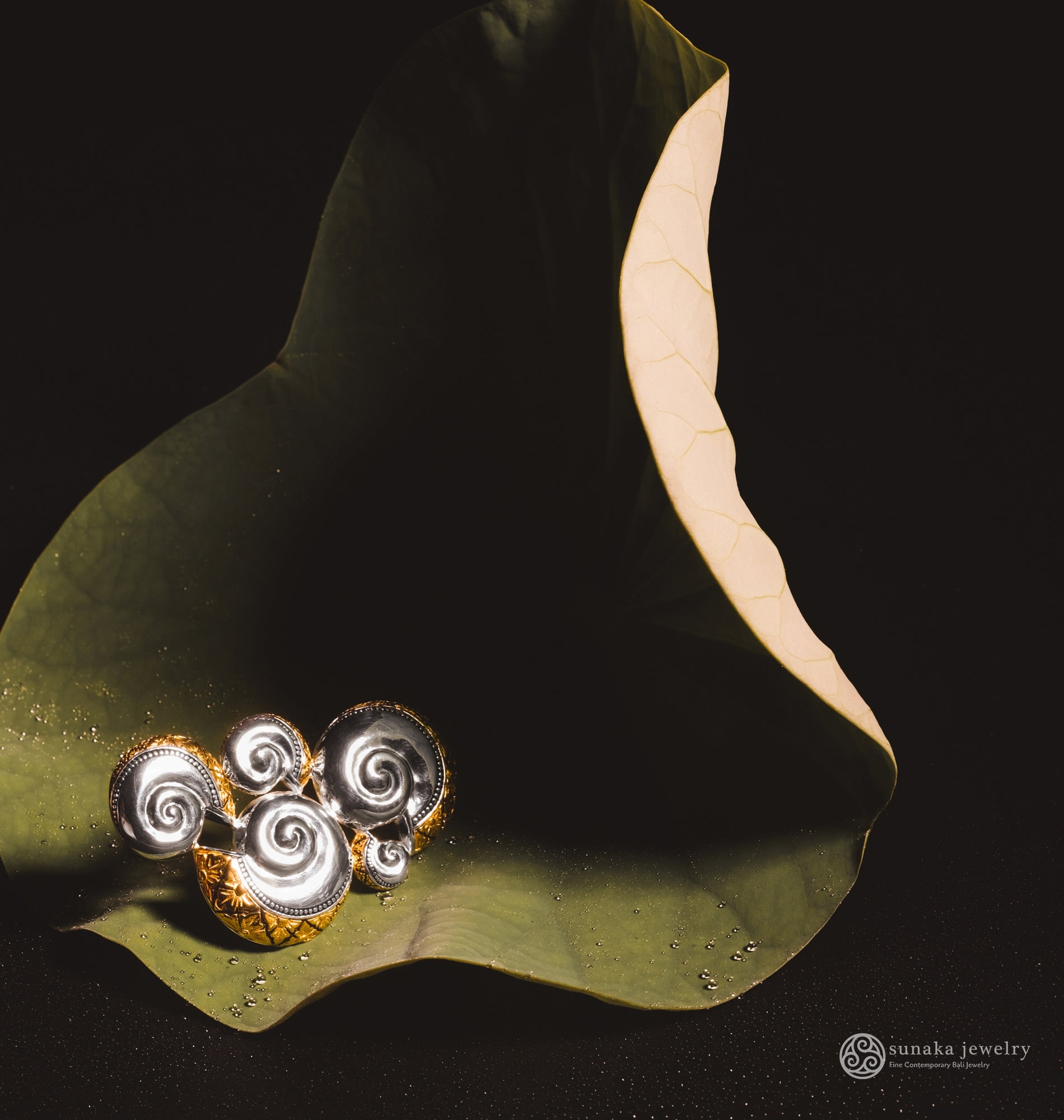 Sunaka Keong Emas brooch styled