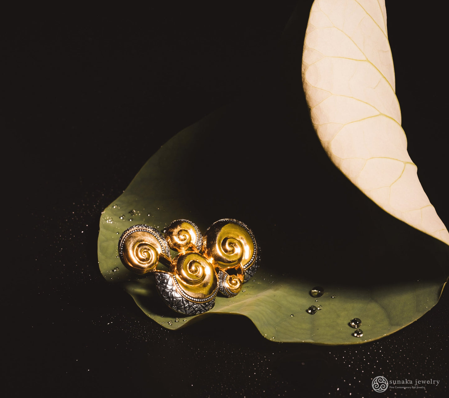 Sunaka Keong Emas brooch styled