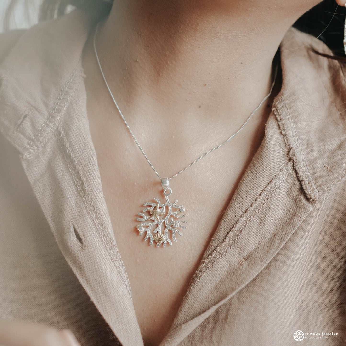 Sunaka Coral Reef pendant worn