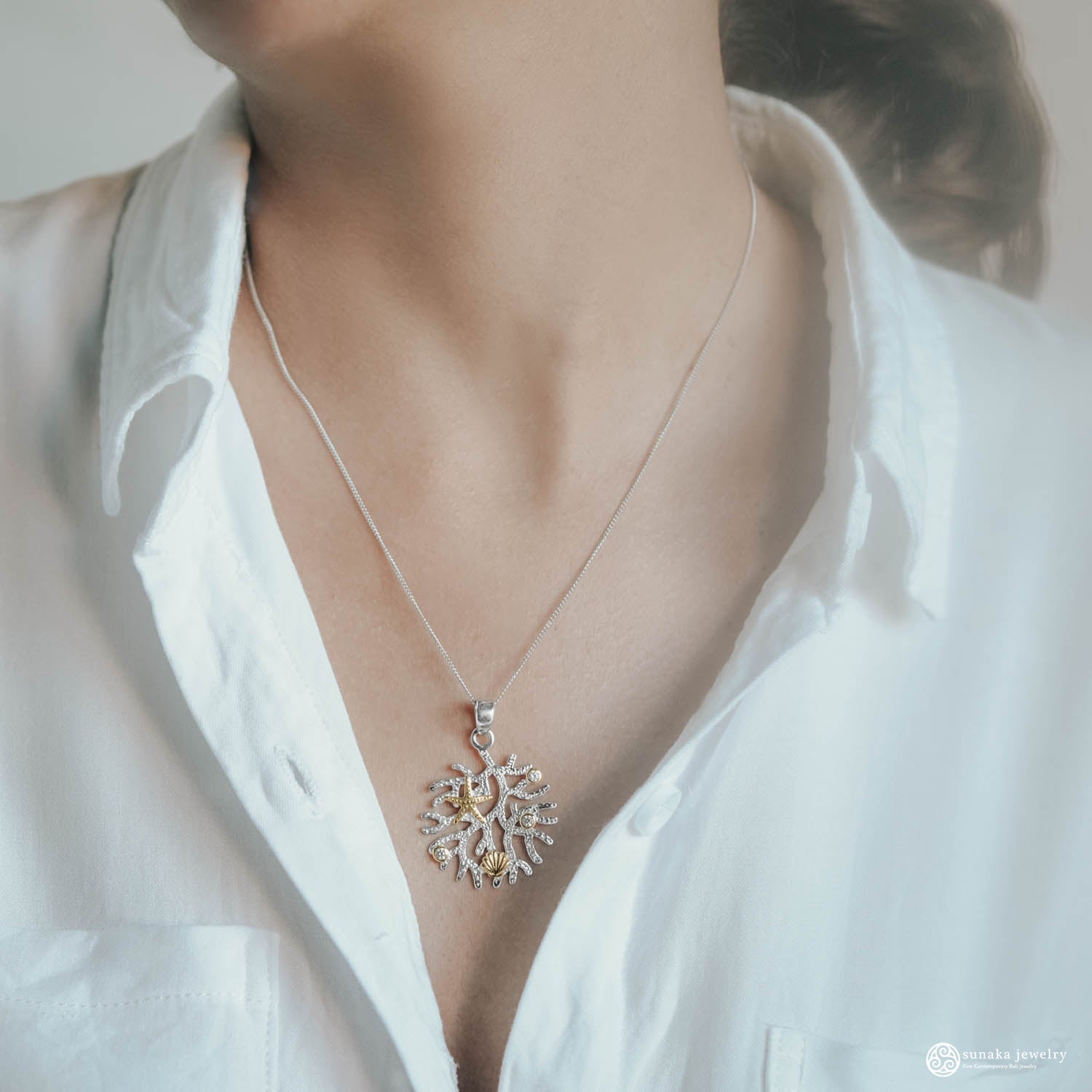 Sunaka Coral Reef pendant worn