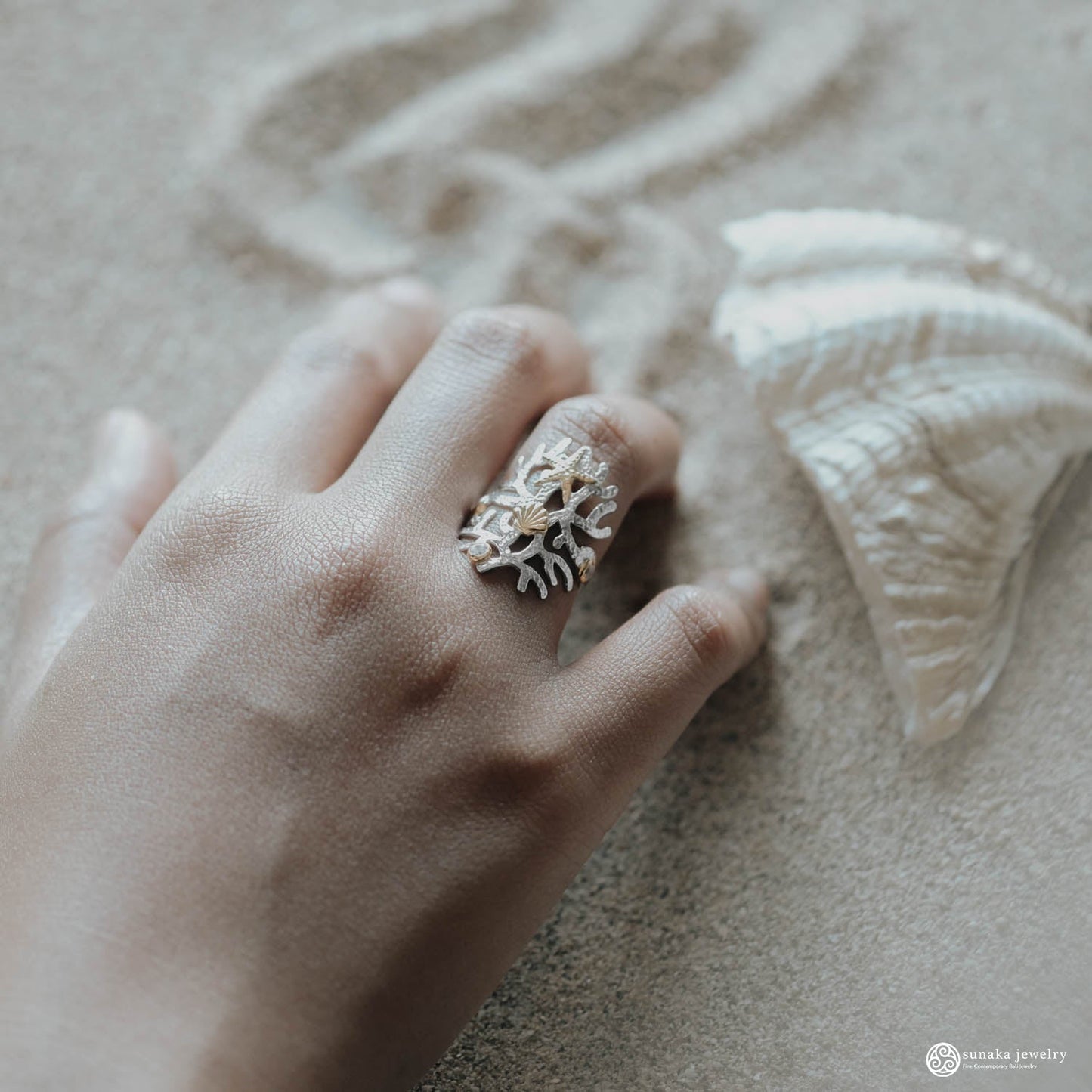 Sunaka Coral Reef ring worn