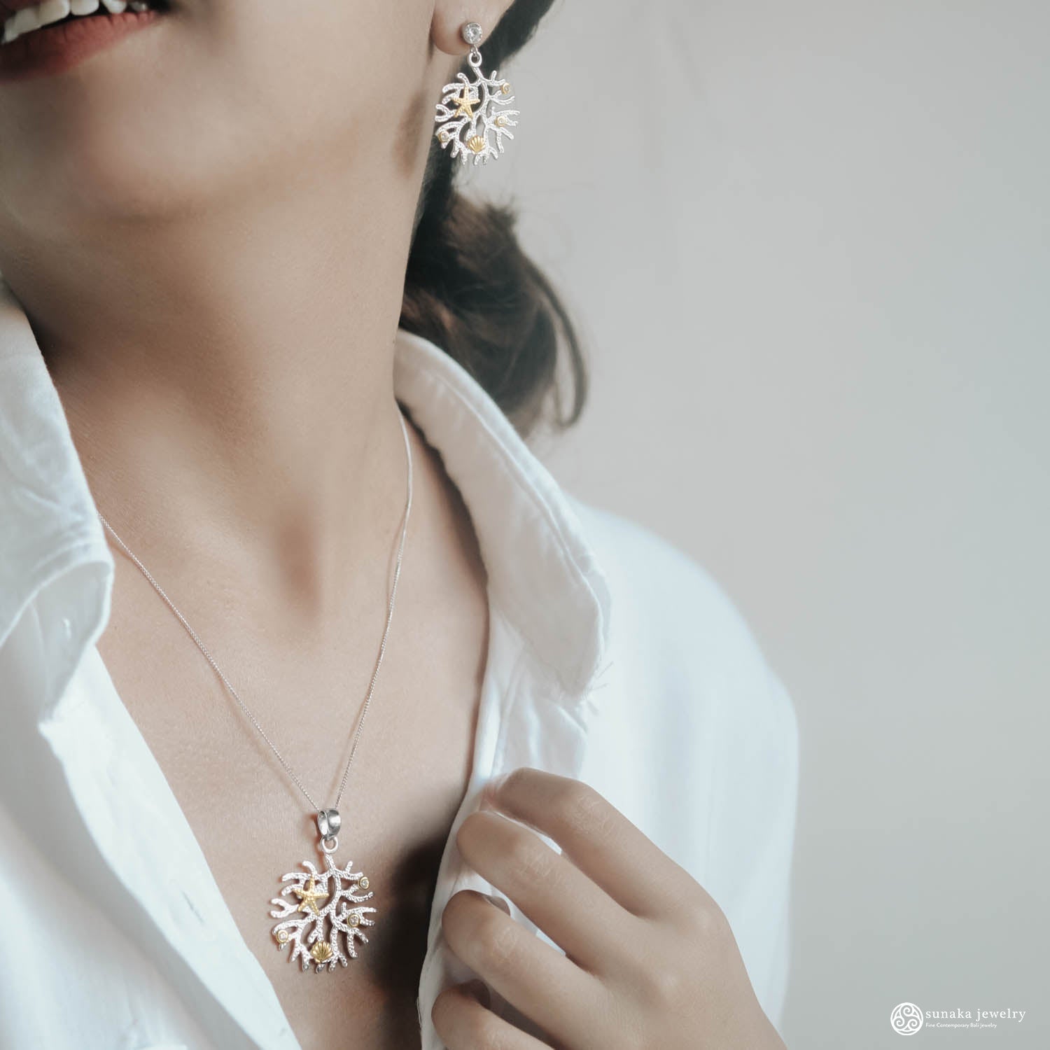 Sunaka Coral Reef pendant worn