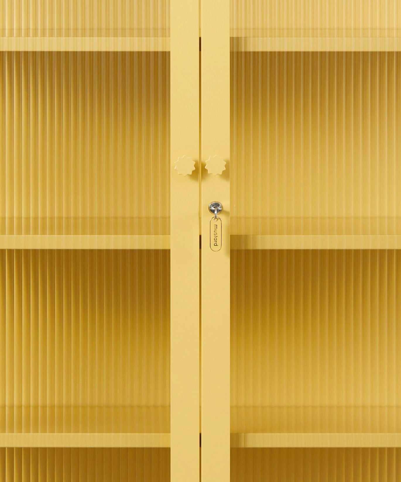 The Collector Glass Locker in Butter — close-up