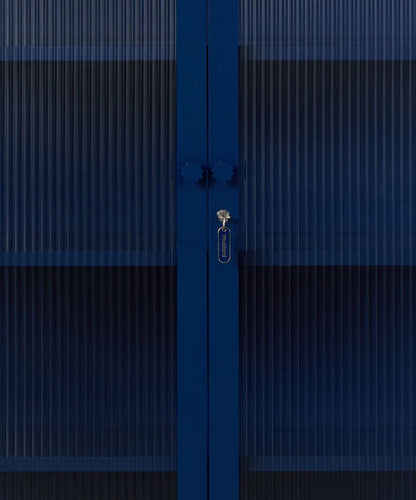 The Collector Glass Locker in Navy — close-up