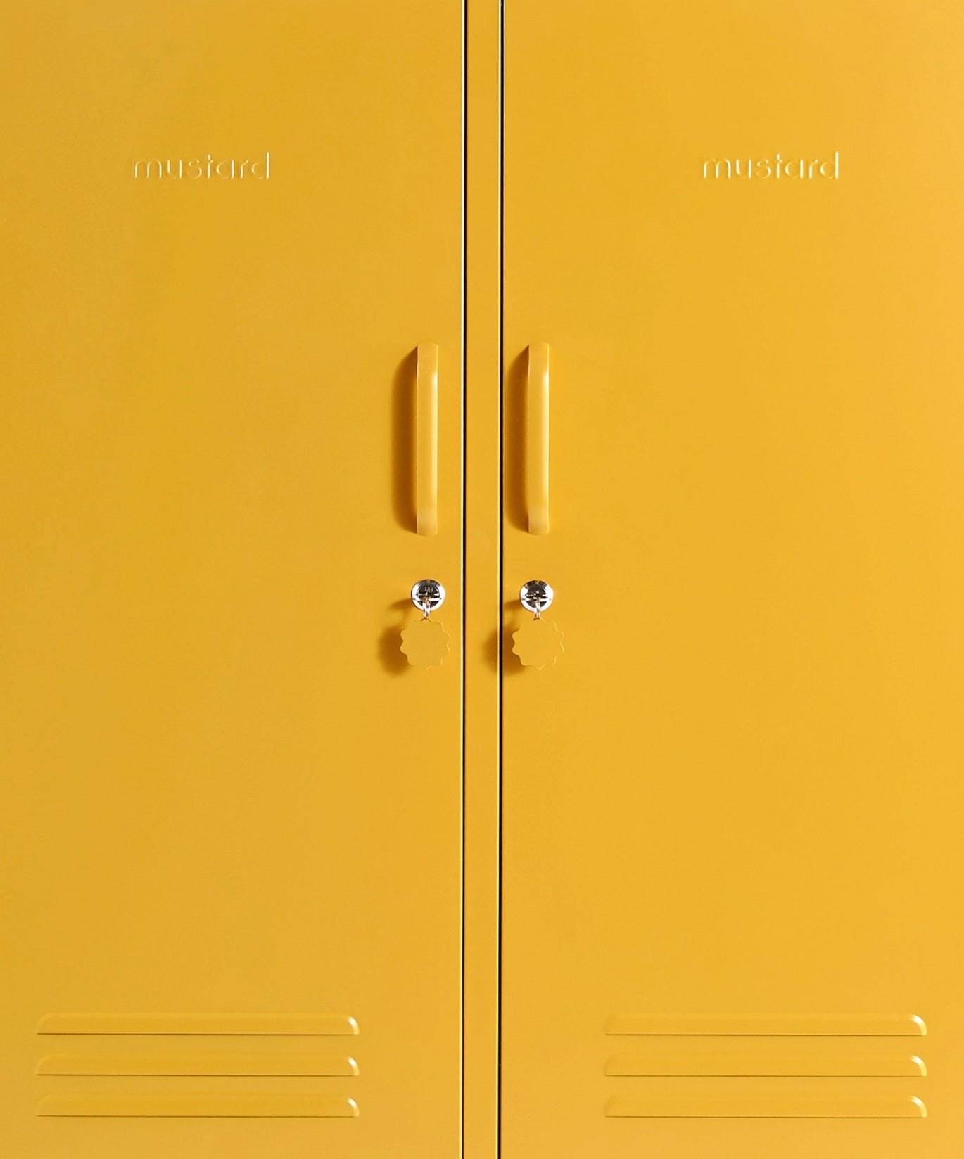 The Midi Locker in Mustard — close-up