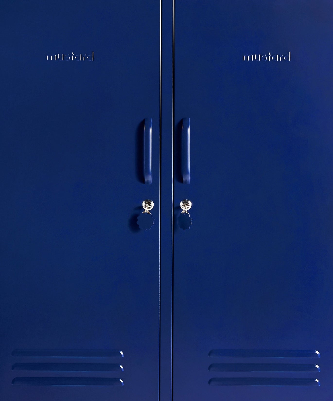 The Midi Locker in Navy — close-up