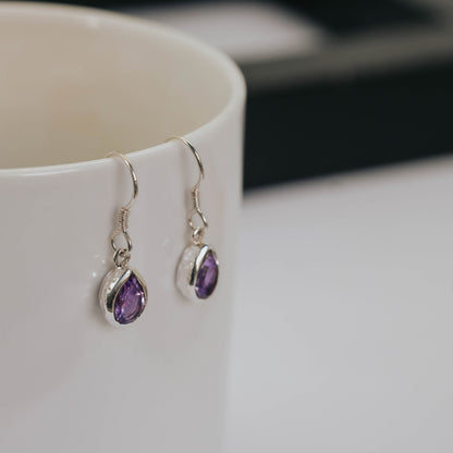 Sunaka hammered garnet earrings styled