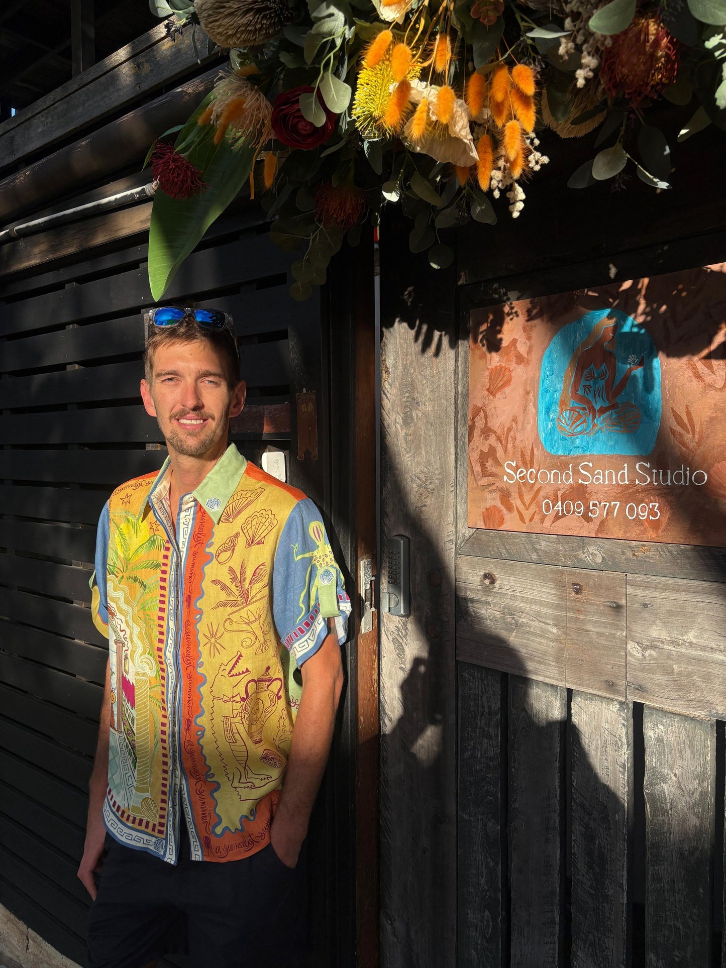Gabriel D'Hage-Craig live mural at the Straddie Arts Trail
